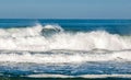 Surfer in a barrel falling under the force of the waves