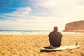 Surfer on the beach waiting for perfect waves Royalty Free Stock Photo