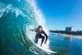 Surfer On Blue Ocean Wave Royalty Free Stock Photo