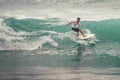 Surfer on Blue Ocean Wave, Bali, Indonesia. Riding in tube. Royalty Free Stock Photo