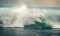 Surfer on Blue Ocean Wave, Bali, Indonesia. Riding in tube. Royalty Free Stock Photo