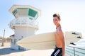 Surfer boy teen with surfboard in Huntinton beach Royalty Free Stock Photo