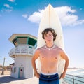 Surfer boy teen with surfboard in Huntinton beach Royalty Free Stock Photo