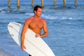 Surfer Carrying Surfboard Royalty Free Stock Photo