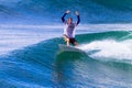 Surfer Celebrates Wave Ride Exit