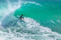 Surfer coming out of the barrel in Bali Royalty Free Stock Photo