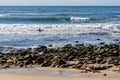 A surfer in Victoria Bay, South Africa Royalty Free Stock Photo