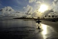 Surfer in a famous beach in Brazil at sunset, Praia do FrancÃÂªs, MaceiÃÂ³, Brasil Royalty Free Stock Photo