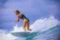 Surfer girl on Amazing Blue Wave Royalty Free Stock Photo