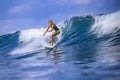 Surfer girl on Amazing Blue Wave Royalty Free Stock Photo