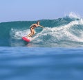 Surfer girl on Amazing Blue Wave Royalty Free Stock Photo