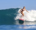 Surfer girl on Amazing Blue Wave Royalty Free Stock Photo