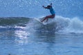 Surfer Girl Carving a Wave in the Outer Banks of NC Royalty Free Stock Photo