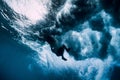 Surfer girl dive underwater. Wave washing surfgirl