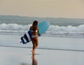 Surfer girl , Kuta Beach, Bali, Indonesia Royalty Free Stock Photo