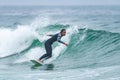 Surfer girl riding a wave Royalty Free Stock Photo