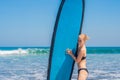 Surfer girl on the sandy beach. Surfer girl. Beautiful young woman at the beach. water sports. Healthy Active Lifestyle. Surfing. Royalty Free Stock Photo