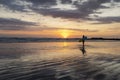 Surfer girl silhouette. Surf woman walking with surfboard Royalty Free Stock Photo