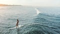 Surfer Girl. Surfing Woman On White Surfboard Swimming In Ocean