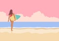 Surfer girl walking on the beach Royalty Free Stock Photo