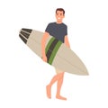 Surfer and his surfboard ready to surf while walking Royalty Free Stock Photo