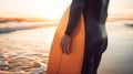 Surfer with his surfboard and wetsuit on the seashore watching the sunset. Generative ai Royalty Free Stock Photo