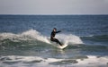 Surfer making a forehand Royalty Free Stock Photo