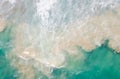 A surfer man paddles across waves in Hong Kong Royalty Free Stock Photo