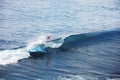 Surfer in ocean. Bali surfing aerial shot