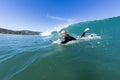 Surfer Paddles Royalty Free Stock Photo