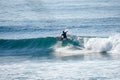 Surfer on perfect blue aquamarine wave, empty line up, perfect for surfing, clean water, Indian Ocean close Royalty Free Stock Photo