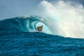 Surfer on perfect blue wave, in the barrel, clean water, Indian Ocean Royalty Free Stock Photo