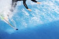 A Surfer Practicing In A Wave Pool Balancing