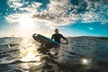 Surfer Relaxing On Surfboard At Sunset In Tenerife Waiting For The Next Good Wave - Sport Travel Concept