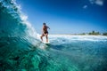 Surfer rides ocean wave