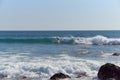 Surfer rides wave surfboard in Costa da Caparica Royalty Free Stock Photo