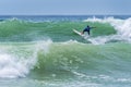 Surfer riding a huge wave during World surf league competition in Lacanau France Royalty Free Stock Photo