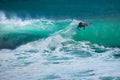 Surfer riding wave in Bali Royalty Free Stock Photo