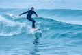 Surfer riding a wave Royalty Free Stock Photo