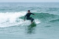 Surfer riding a wave Royalty Free Stock Photo