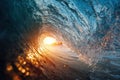 Surfer's Perspective Inside Wave Tube at Sunset with Dramatic Light and Color Royalty Free Stock Photo