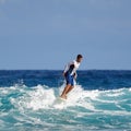 Surfer school. Surfer on the wave. beautiful ocean wave. Water sport activity. Atlantic Ocean, Dominican Republic.