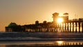 Surfer silhouette, pacific ocean beach sunset. People enjoy surfing. Oceanside, California USA Royalty Free Stock Photo