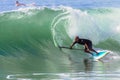 Surfer SUP Riding Wave Royalty Free Stock Photo