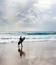 Surfer surfboard walking beach Portugal Royalty Free Stock Photo