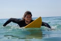 Surfer surfboarding in the sea Royalty Free Stock Photo