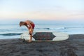 Surfer. Surfing Man On Sandy Beach Going To Surf On Surfboard In Beautiful Ocean. Water Sport For Active Lifestyle Royalty Free Stock Photo