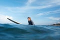 Surfer. Surfing Man On Surfboard Portrait. Guy In Wetsuit Swimming In Ocean. Royalty Free Stock Photo