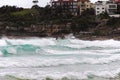 a surfer is surfing in the ocean on top of waves Royalty Free Stock Photo