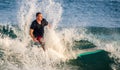 Surfer surfing with waves